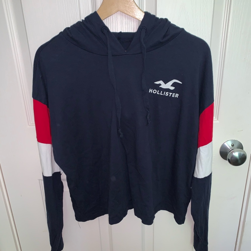 A light weight long sleeve with a hood